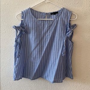 NWT 2 Sleeveless shirts for the price of one!